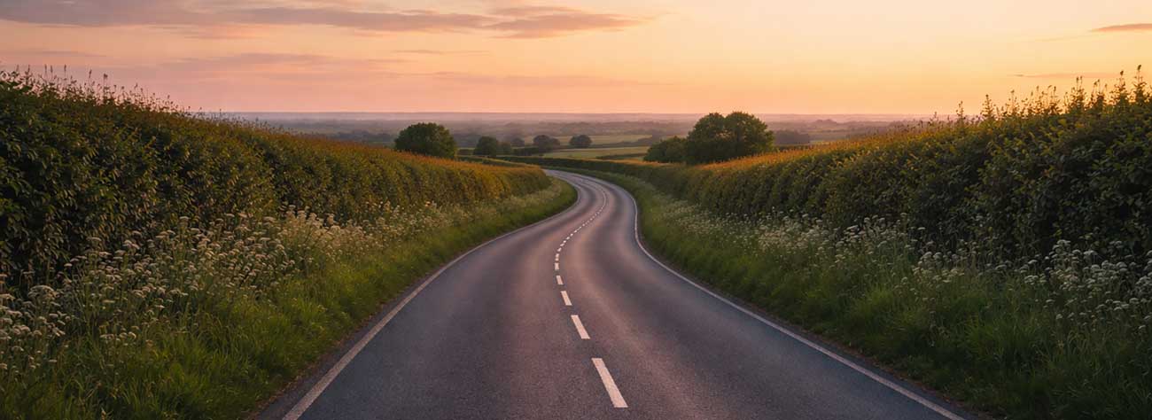 Calm UK road scene under soft evening light